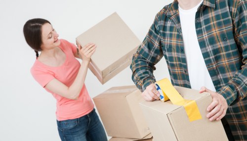 Efficient Enfield Man with Van loading items