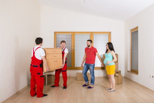 Satisfied customers with Enfield Man with Van after a move